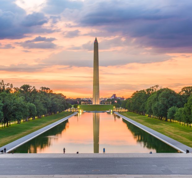 Washington Monument on the Reflecting Pool in Washington, D.C. at dawn.